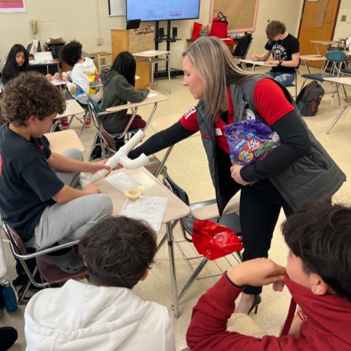 Charlotte Pipe employee presenting to middle school students