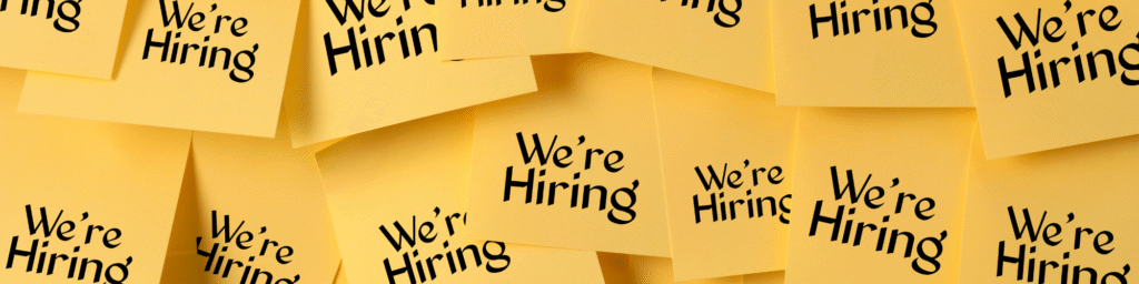 Post it Notes with "we're Hiring" written on it