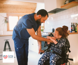 Man helping girl in wheelchair