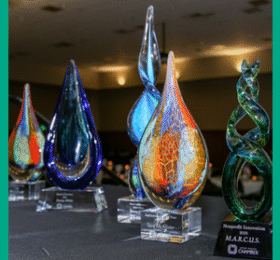 Excellence in Business Awards on a table