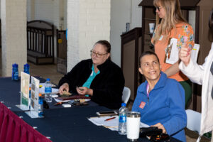 Tiffany Weaver helping with golf registration