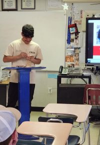 student at podium learning about Decore-Ative Specialties during Make It In Union County Week